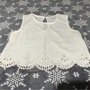 Slightly see through tank top w cutout design